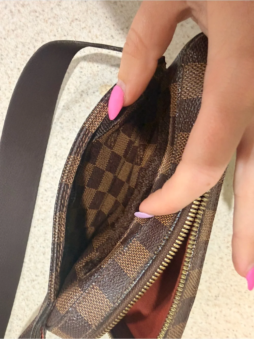 Authentic Louis Vuitton -  Ebene Geronimos Sling